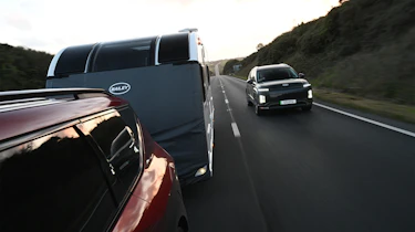 EV tow test - Hyundai following Kia and caravan
