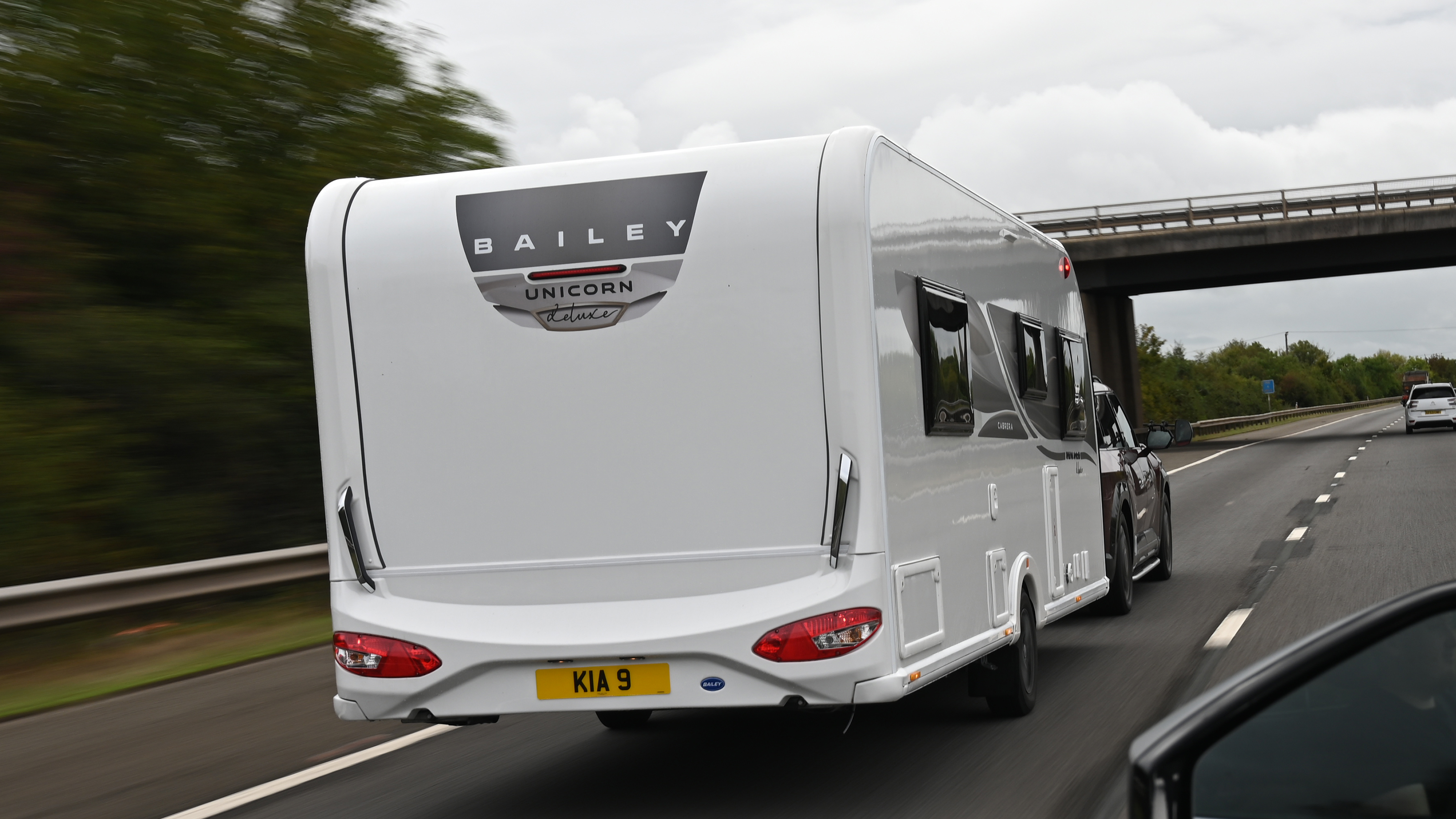 EV tow test - rear of caravan on motorway