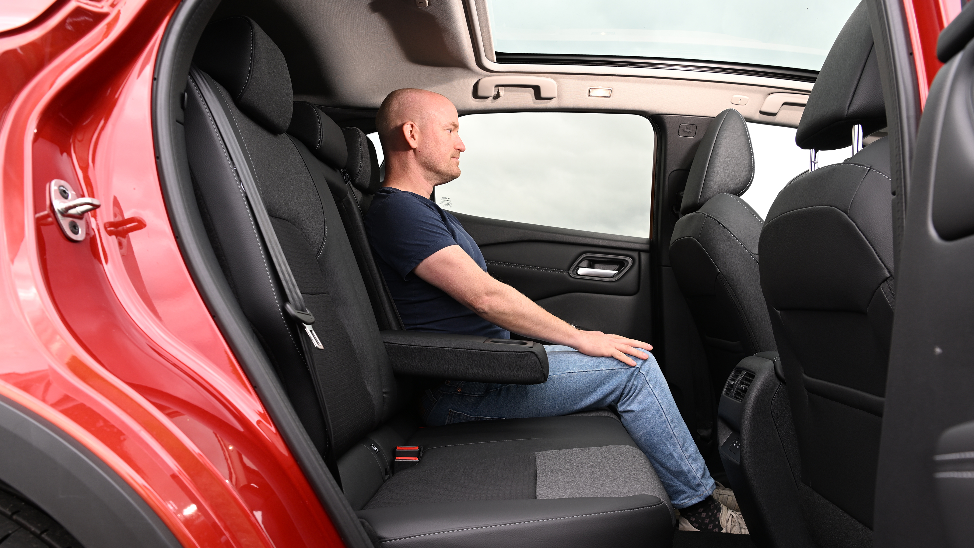 Nissan Qashqai e-Power - rear seats being sat in by Auto Express chief reviewer Alex Ingram 