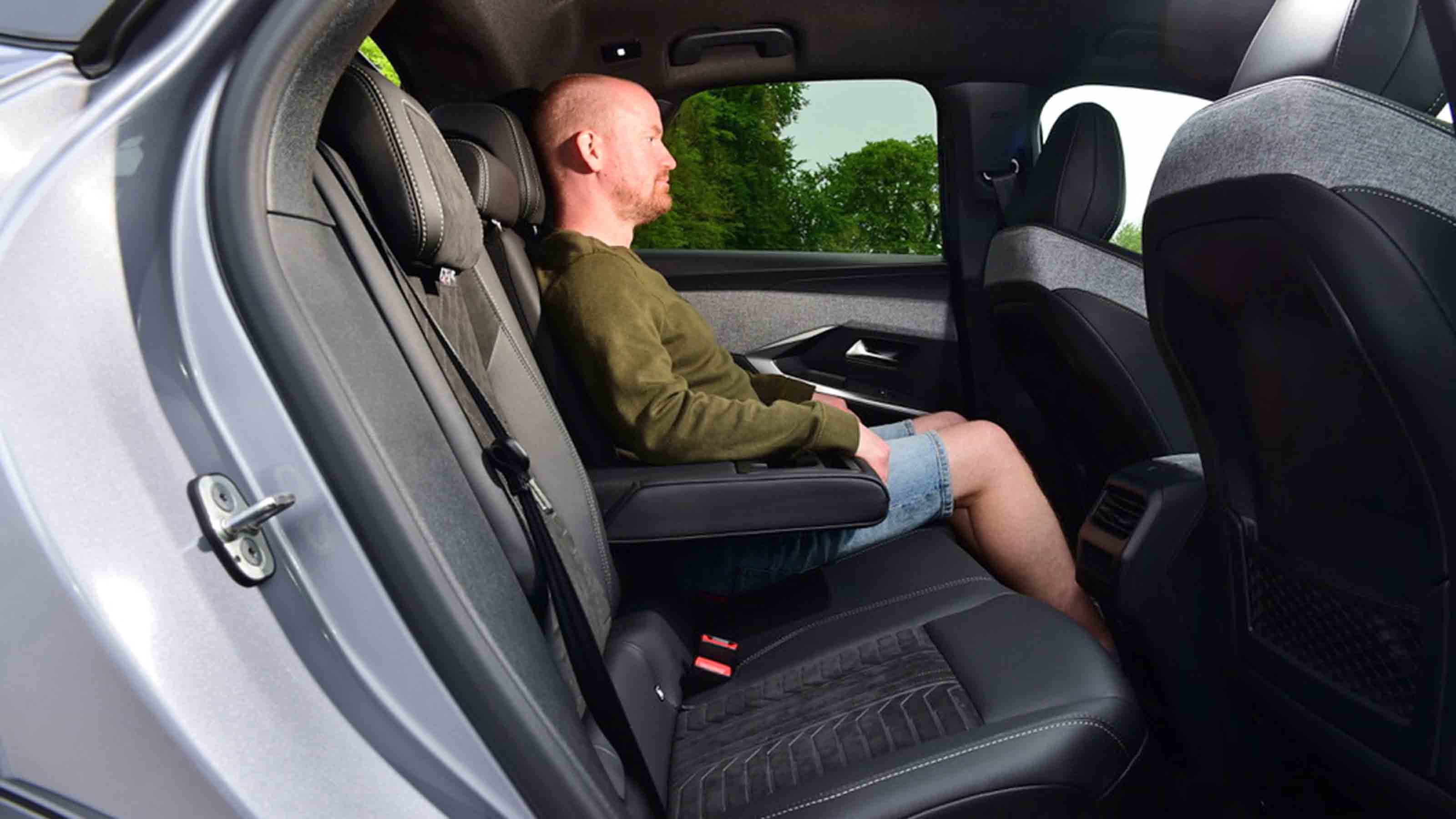 Peugeot E-3008 - rear seats with Chief reviewer, Alex Ingram