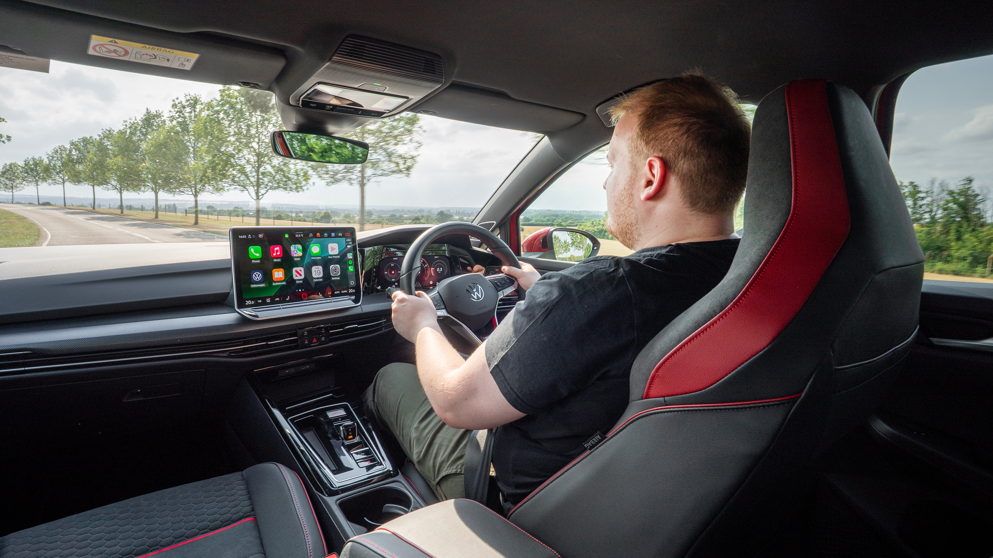 Auto Express news reporter Ellis Hyde driving the Volkswagen Golf GTI Clubsport
