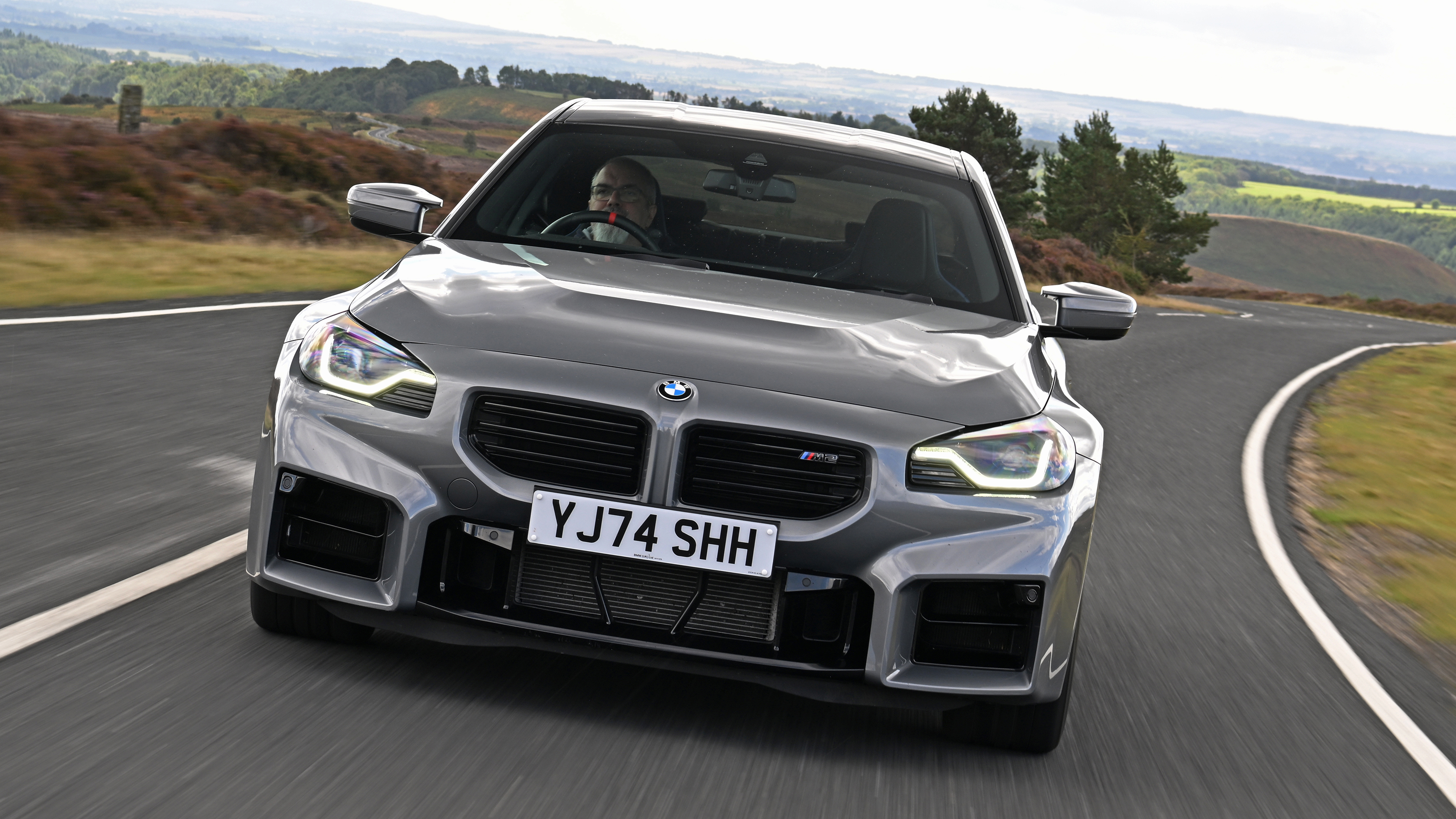 New BMW M2 being driven in the UK - front action