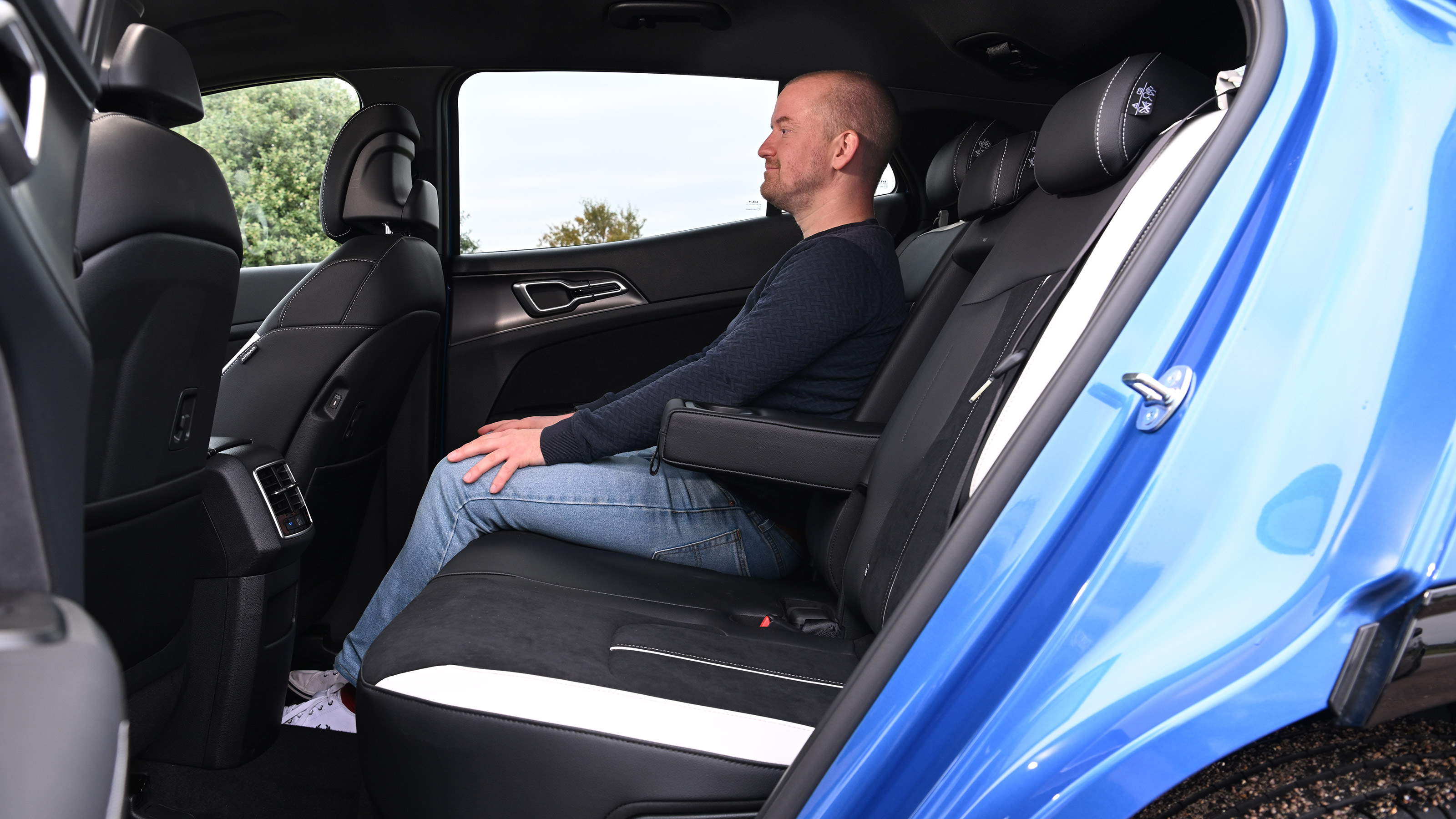 Alex Ingram sat in the Kia Sportage