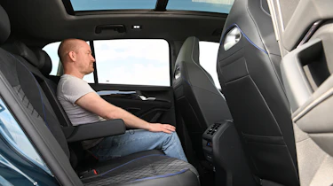 Volkswagen Tiguan - rear seats being sat in by Auto Express chief reviewer Alex Ingram