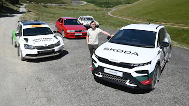 Auto Express consumer reporter Tom Jervis standing with a selection of Skoda vRS cars