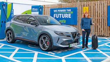 Alfa Romeo Junior Elettrica - Dawn with car charging