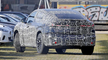 BMW iX4 - rear 3/4