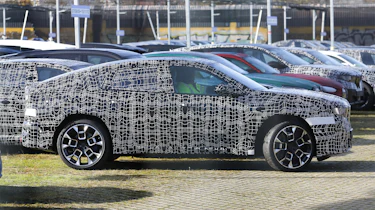 BMW iX4 - side profile
