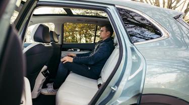 Alastair Crooks sat in the Geely EX5