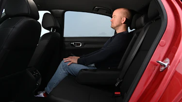 Auto Express special contributor Alex Ingram sitting in the Honda Civic's rear seat