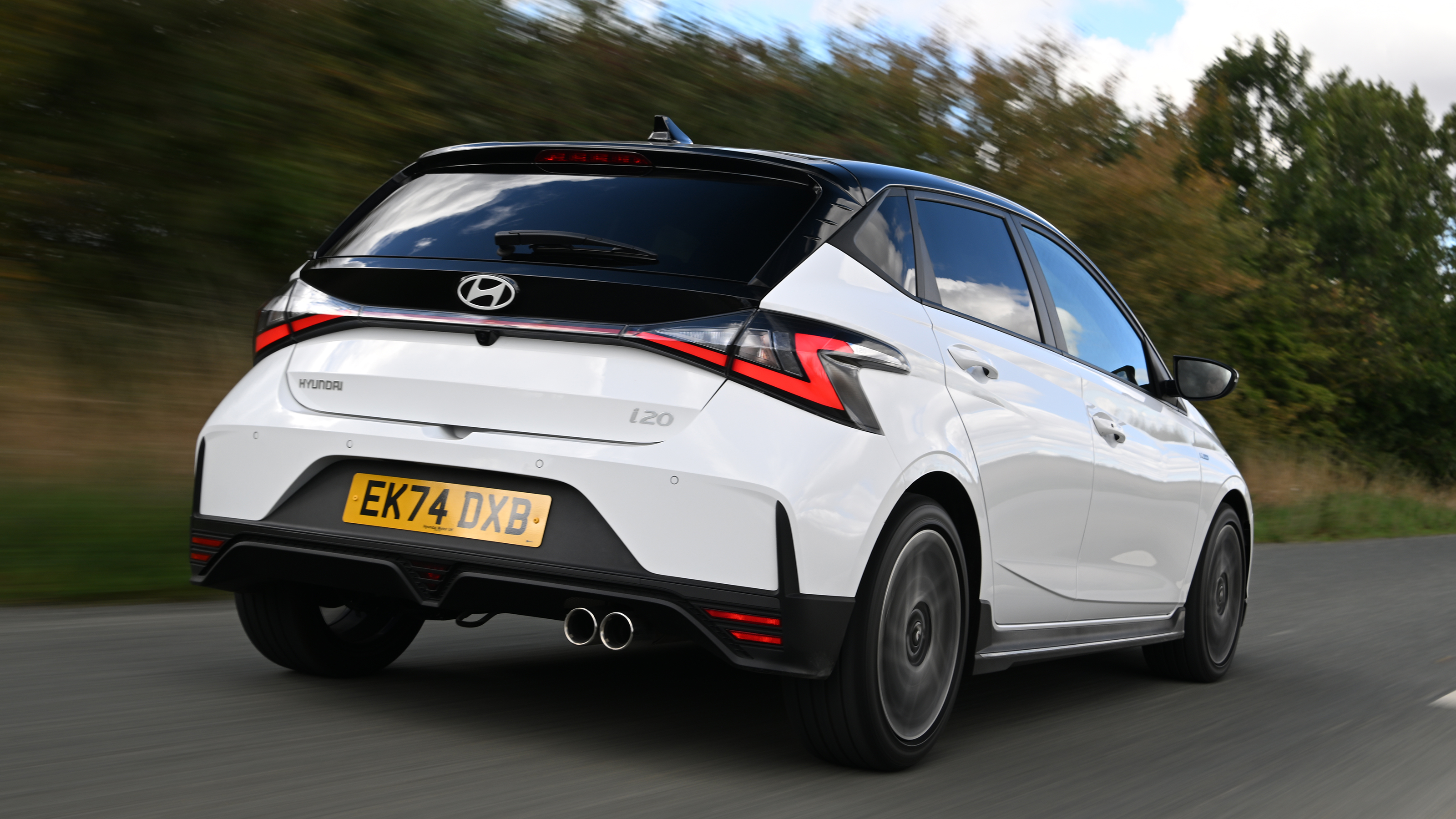 Hyundai i20 being driven in the UK - rear tracking 
