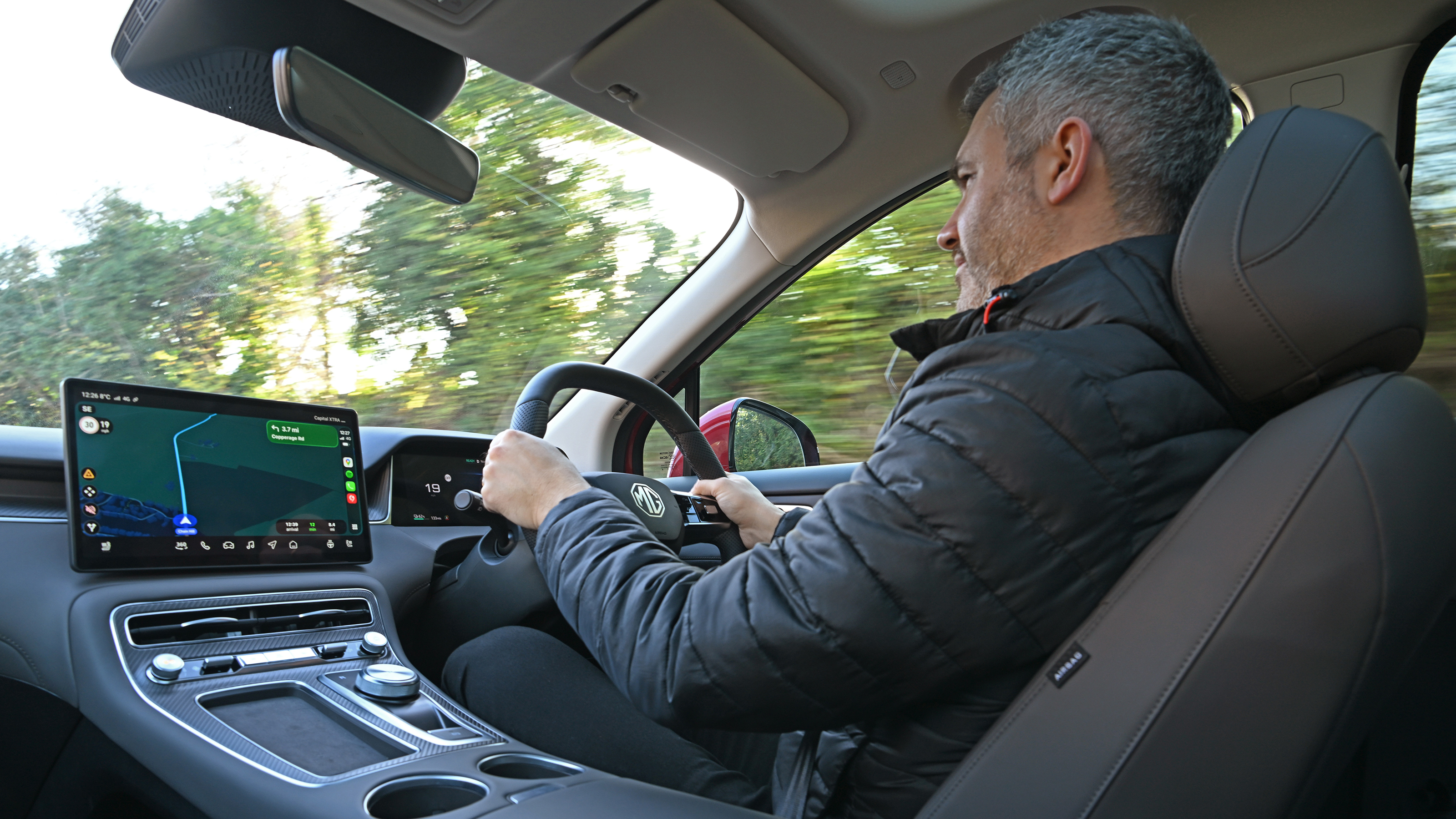 Auto Express deputy editor Richard Ingram driving the MGS6 EV Trophy Long Range
