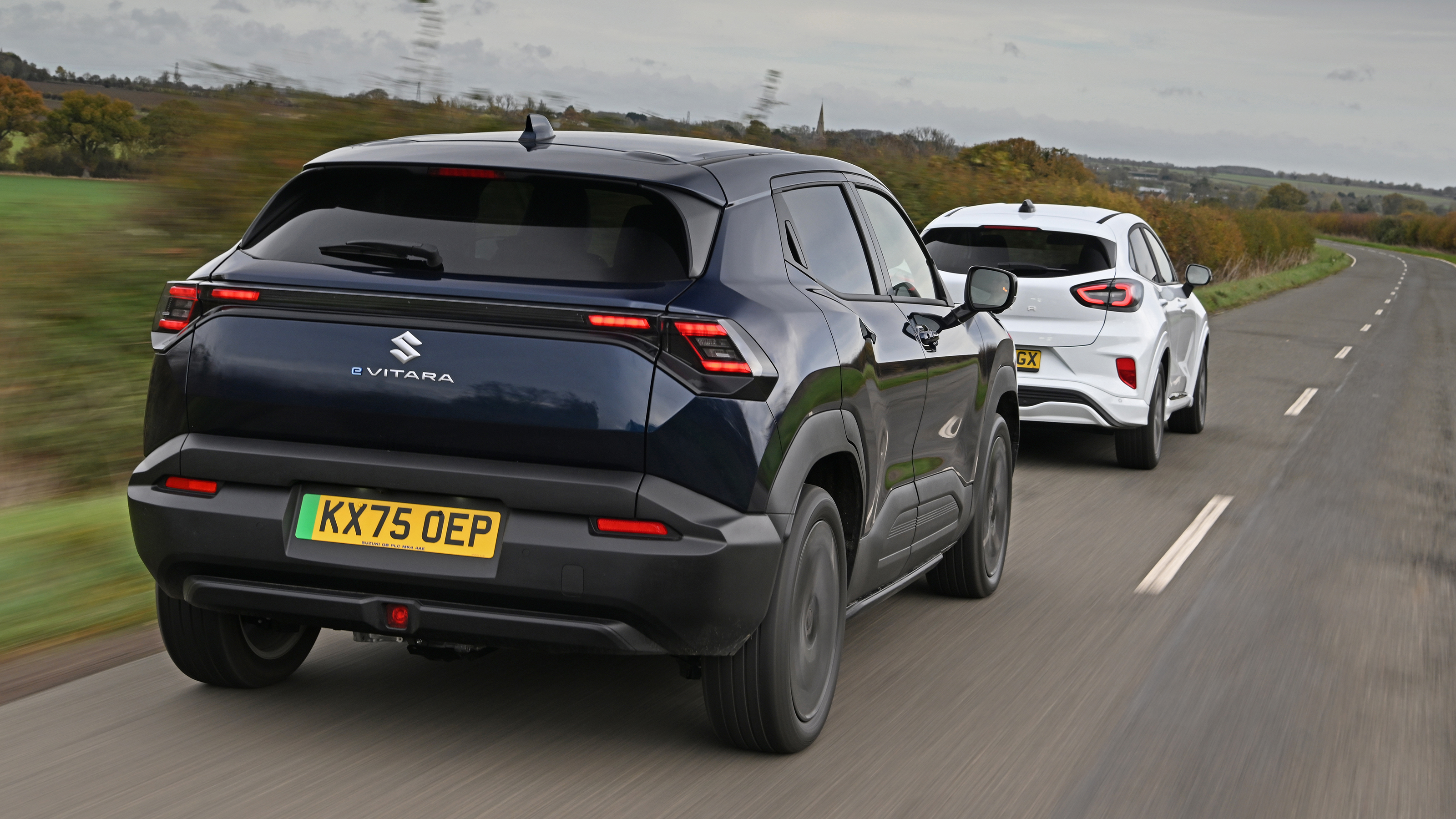 Suzuki e Vitara vs Ford Puma Gen-E - rear 3/4