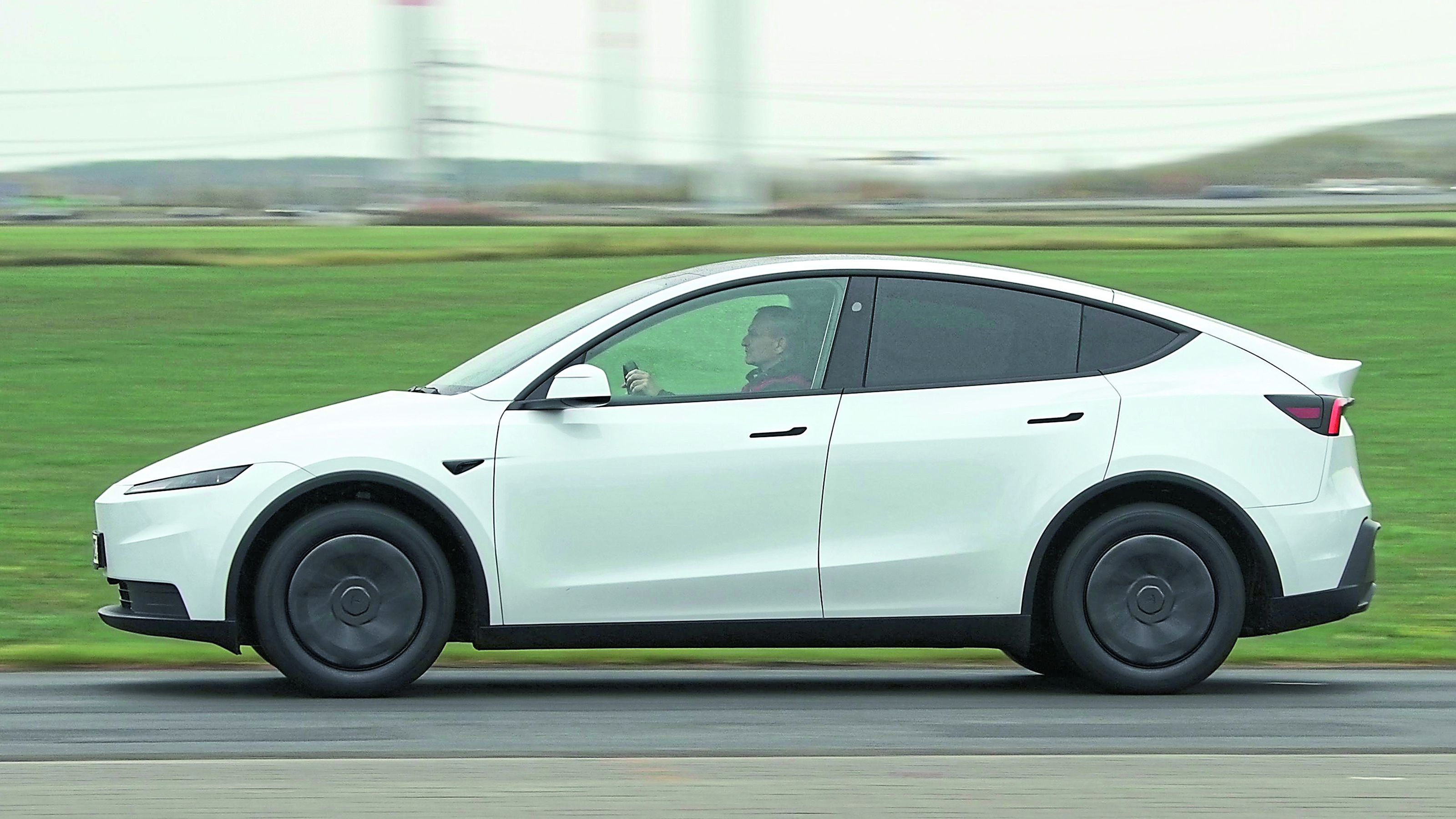 New Tesla Model Y Standard - side action