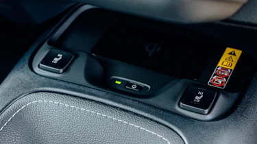 Toyota Corolla Excel in the UK - centre console, heated seats and wireless phone charging pad