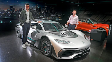 Auto Express consumer reporter Tom Jervis standing next to a Mercedes-AMG One