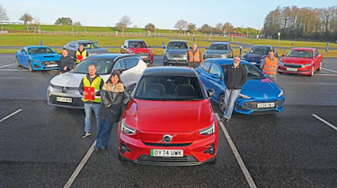 Auto Express team members standing with a selection of cars