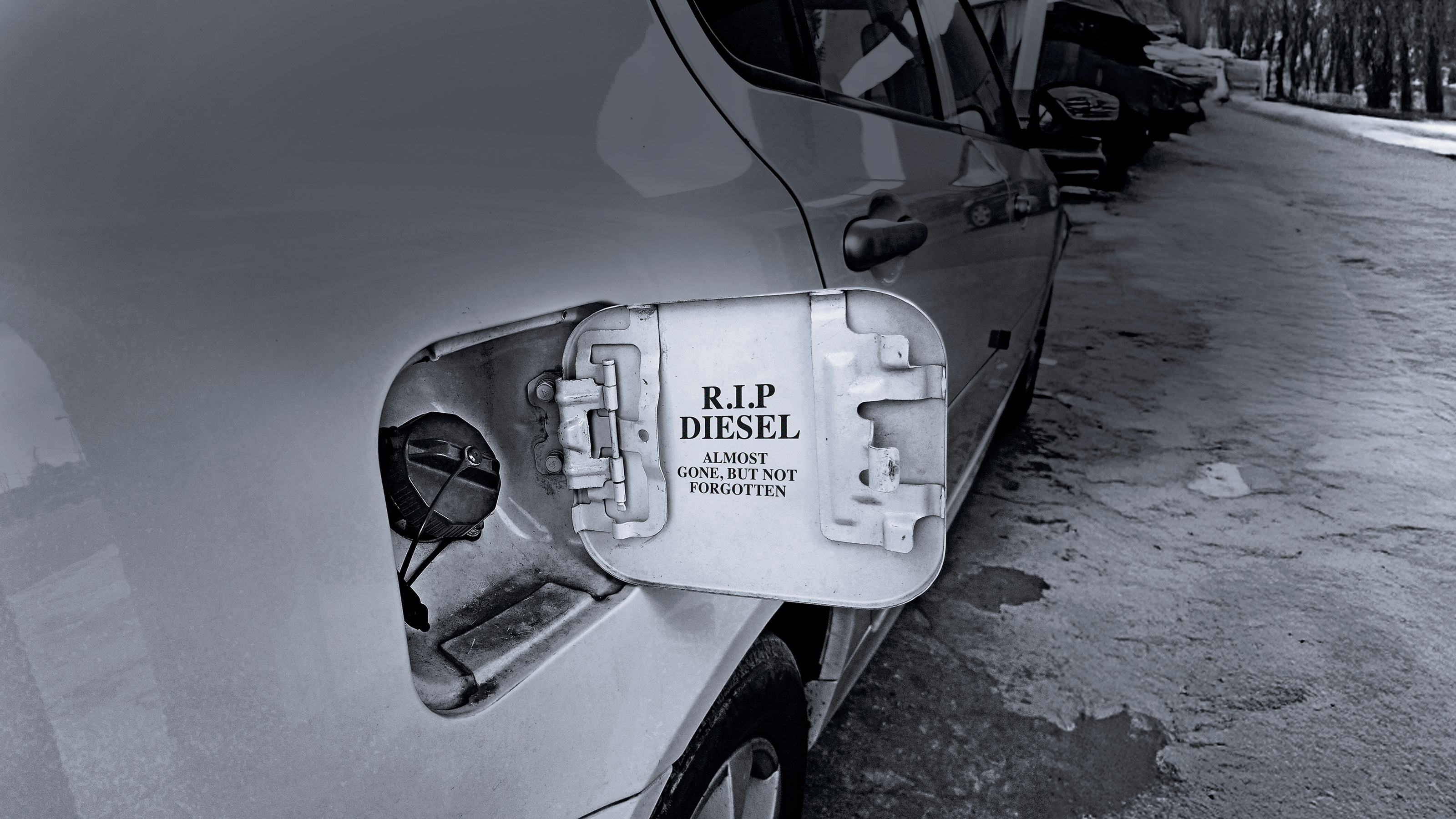 Fuel-filler flap with 'RIP diesel' written on it