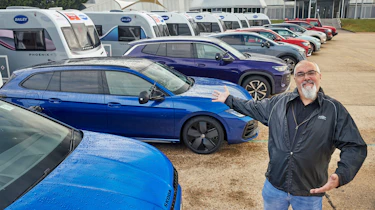 Auto Express senior road test editor Dean Gibson stood next to a selection of towing cars