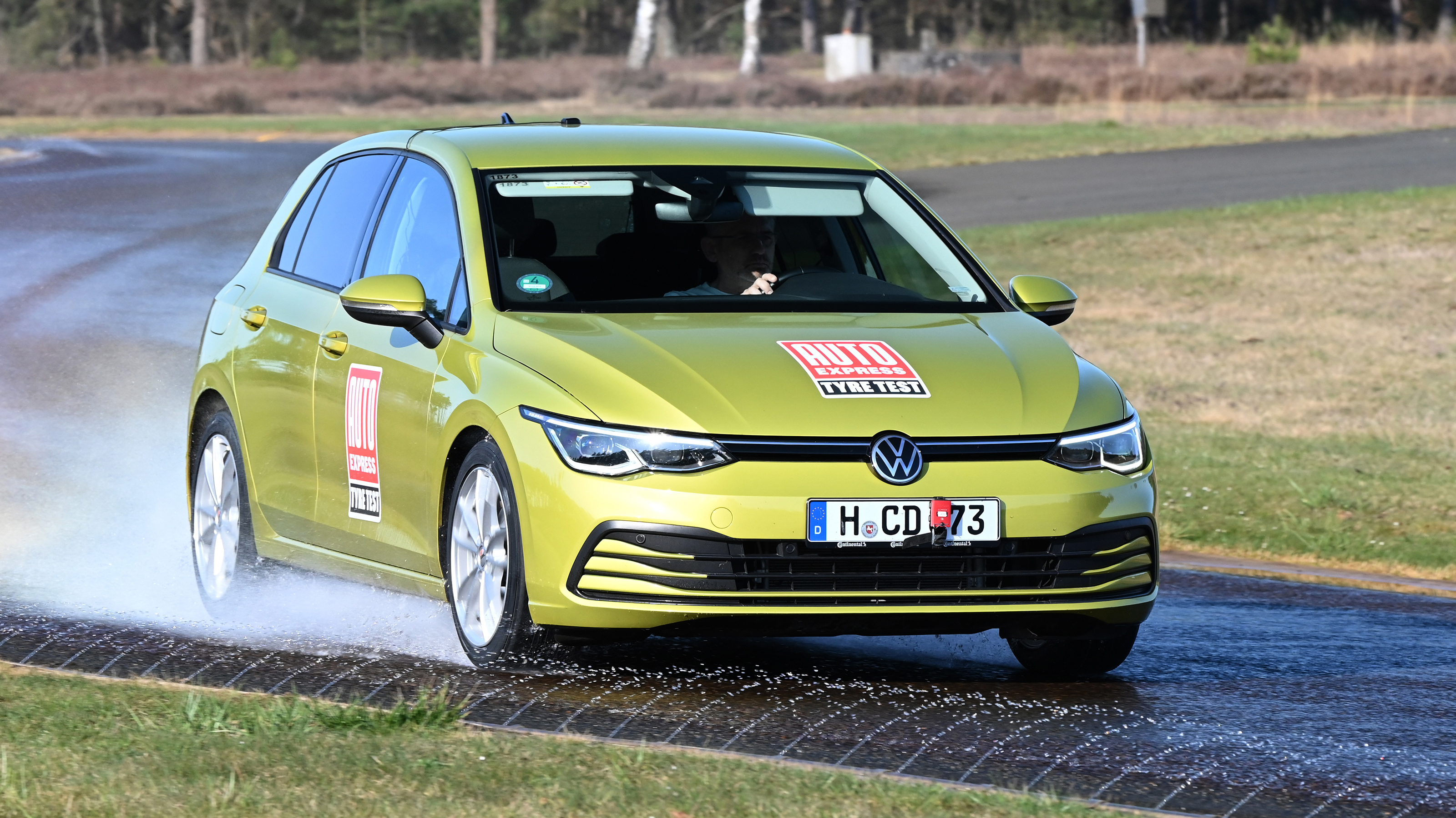 VW Golf tyre testing car driving through water