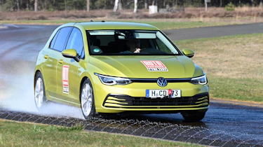 VW Golf tyre testing car driving through water