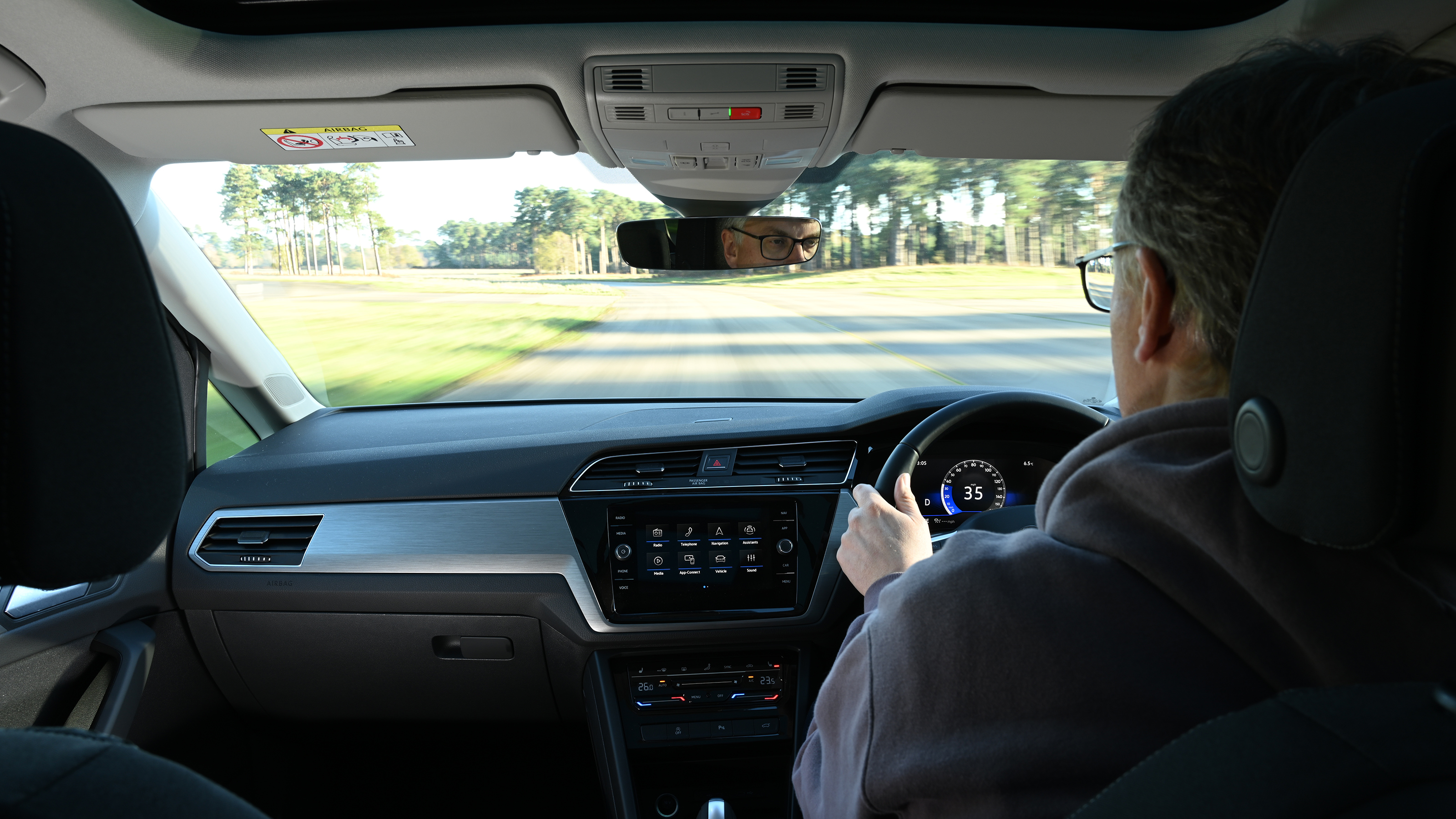 Auto Express editor Paul Barker driving a Volkswagen Touran