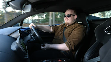 Auto Express news reporter Ellis Hyde driving an Alpine A110