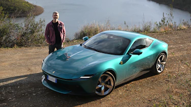 Auto Express deputy editor Richard Ingram standing next to the Ferrari Amalfi