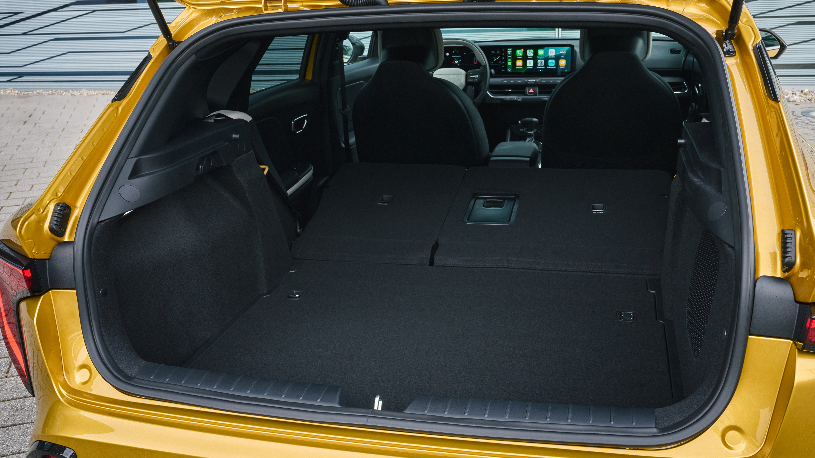Kia K4 2025 - boot seats down