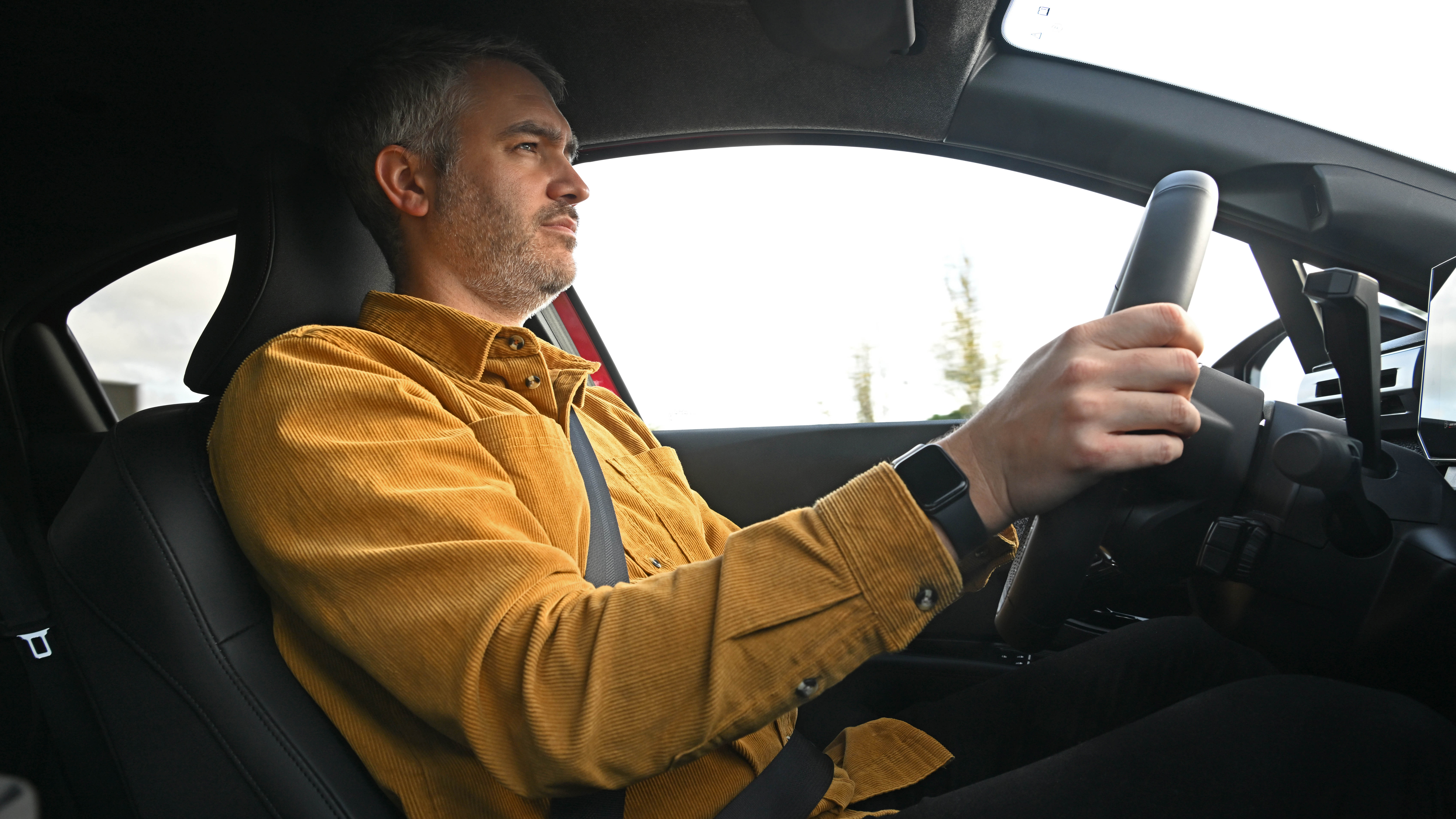 Richard Ingram driving the Renault Clio Hybrid E-Tech