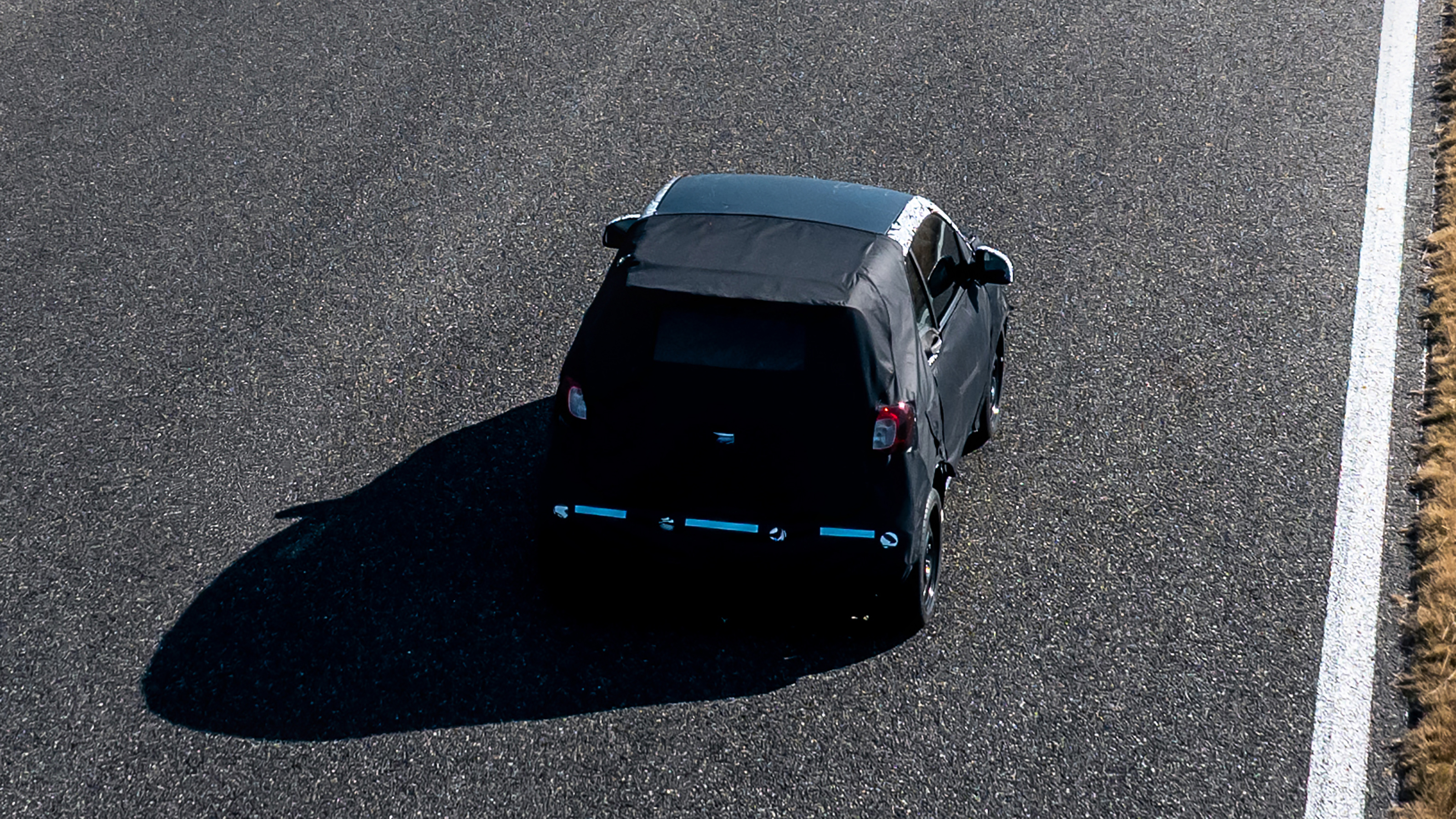 Smart #2 (camouflaged) - top-down rear action