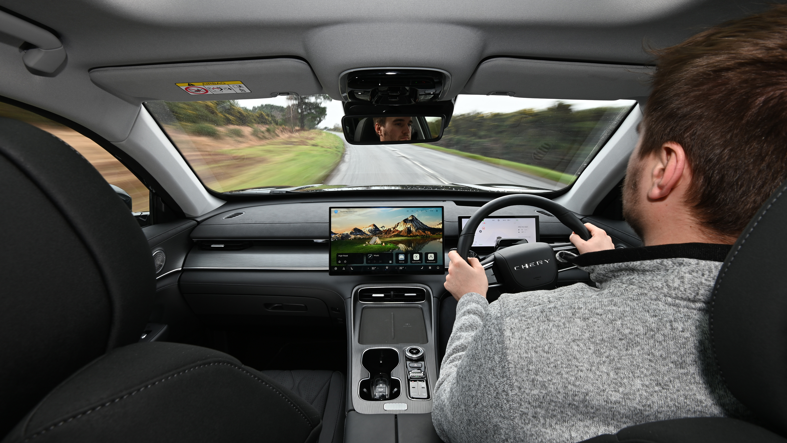 Auto Express senior news reporter Alastair Crooks driving the Chery Tiggo 8