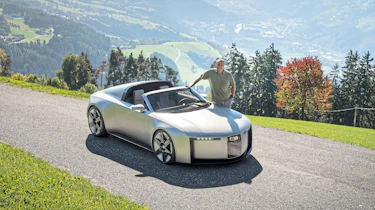 Thomas Geiger standing next to the Audi Concept C