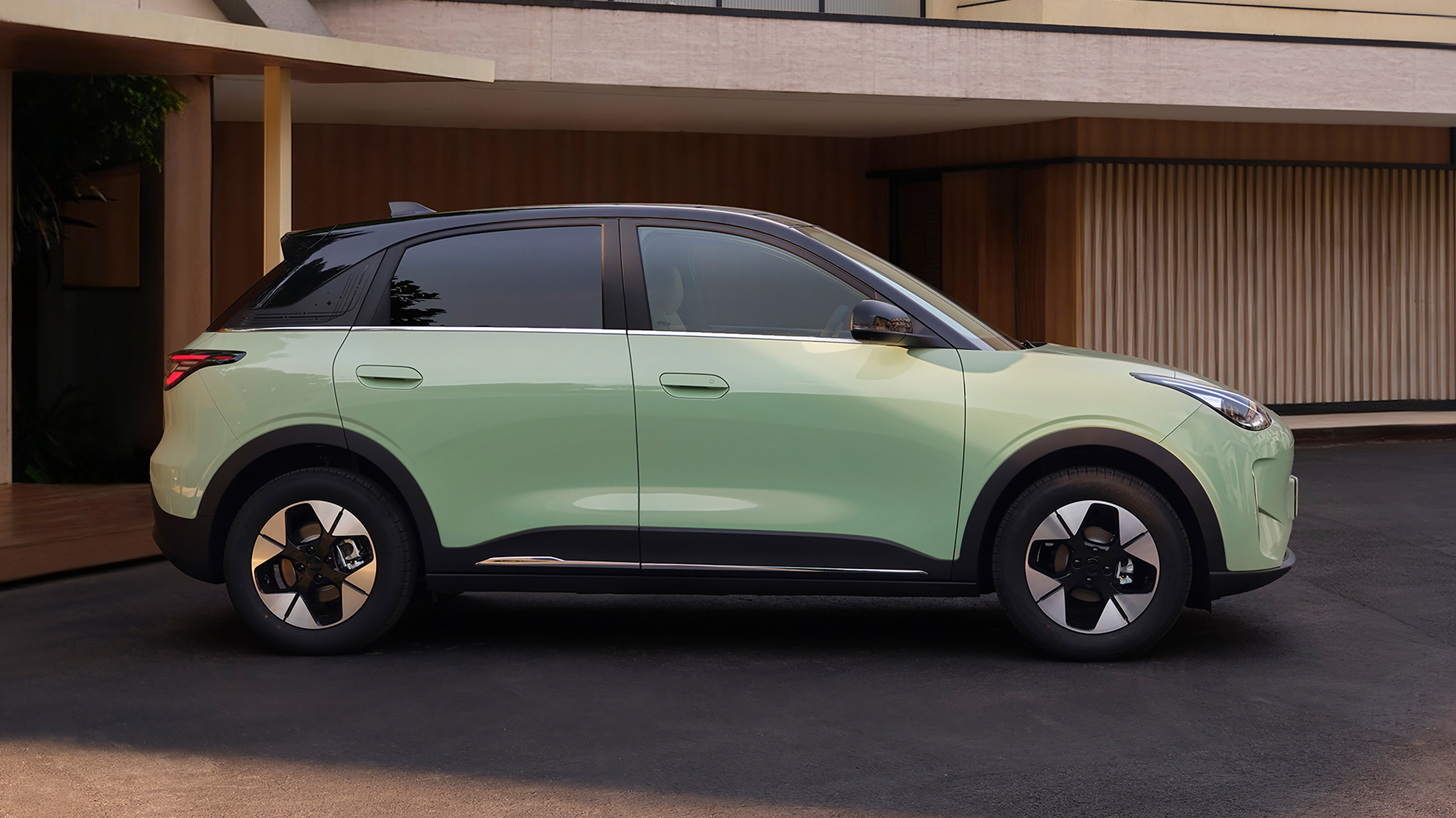 Geely EX2 - green side profile