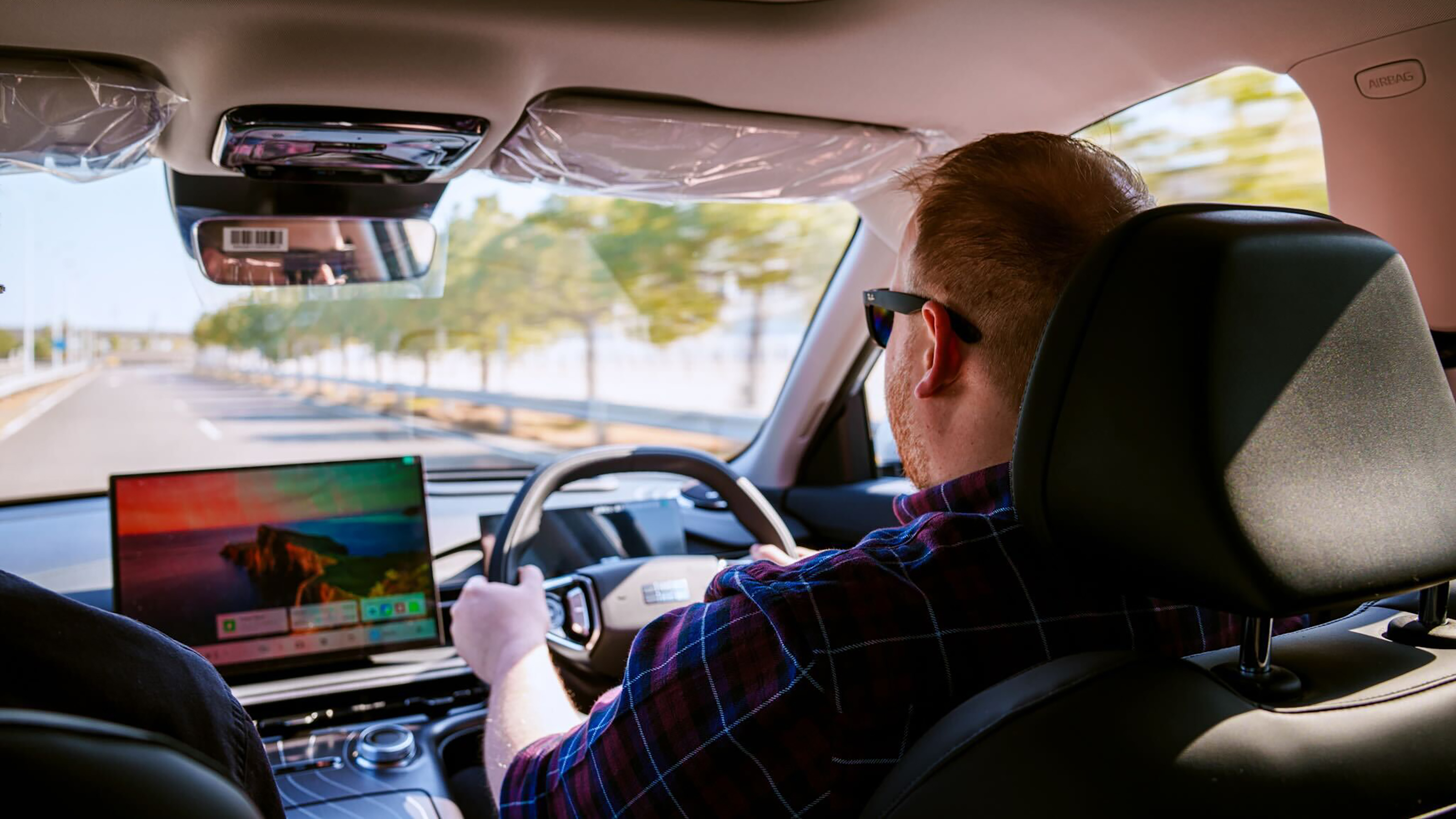 Auto Express news reporter Ellis Hyde driving the Geely Starray EM-i