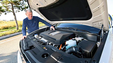 Tomas Hirschberger looking at the Hyundai Nexo's engine bay