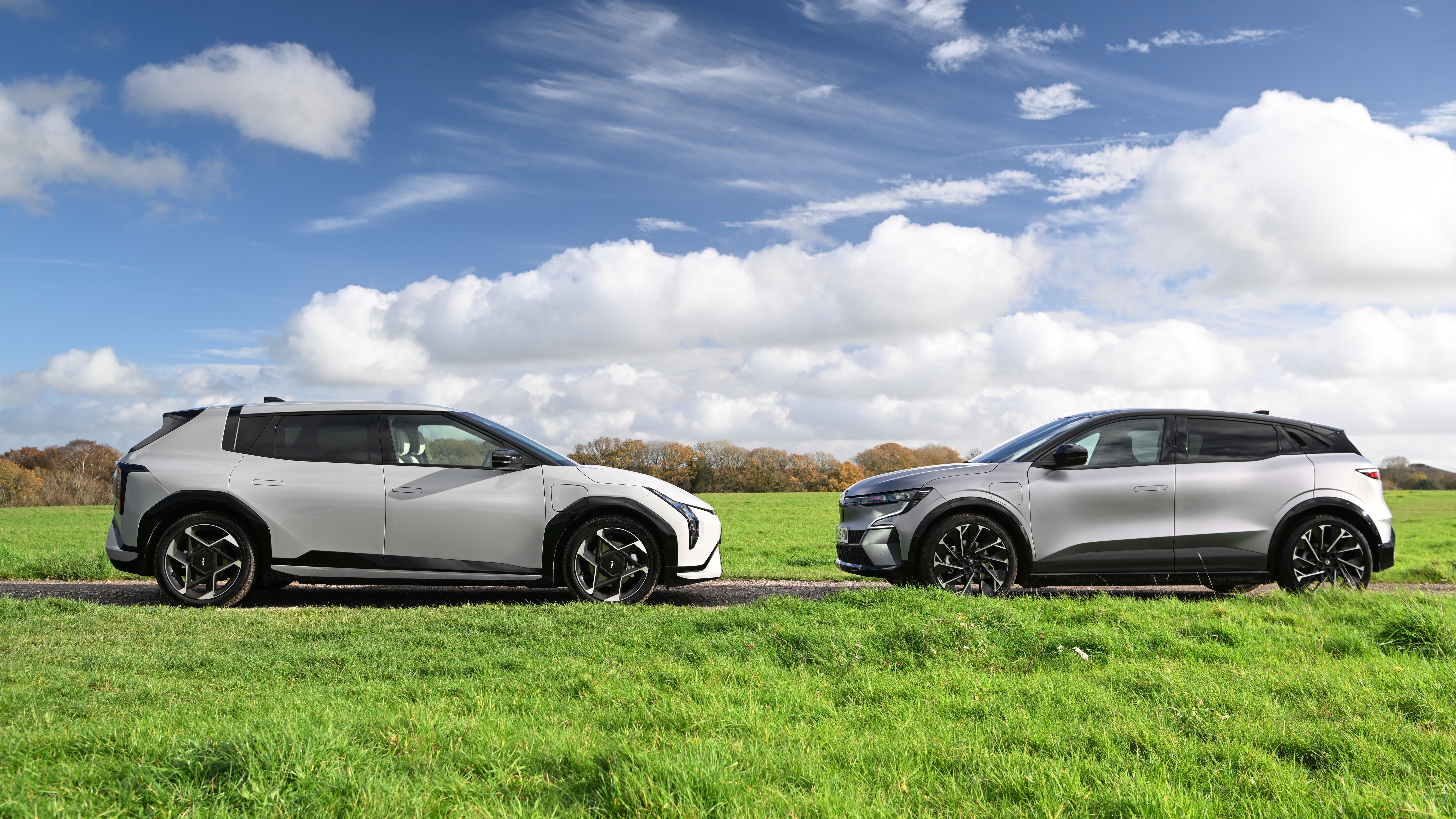 Kia EV4 and Renault Megane - side static 
