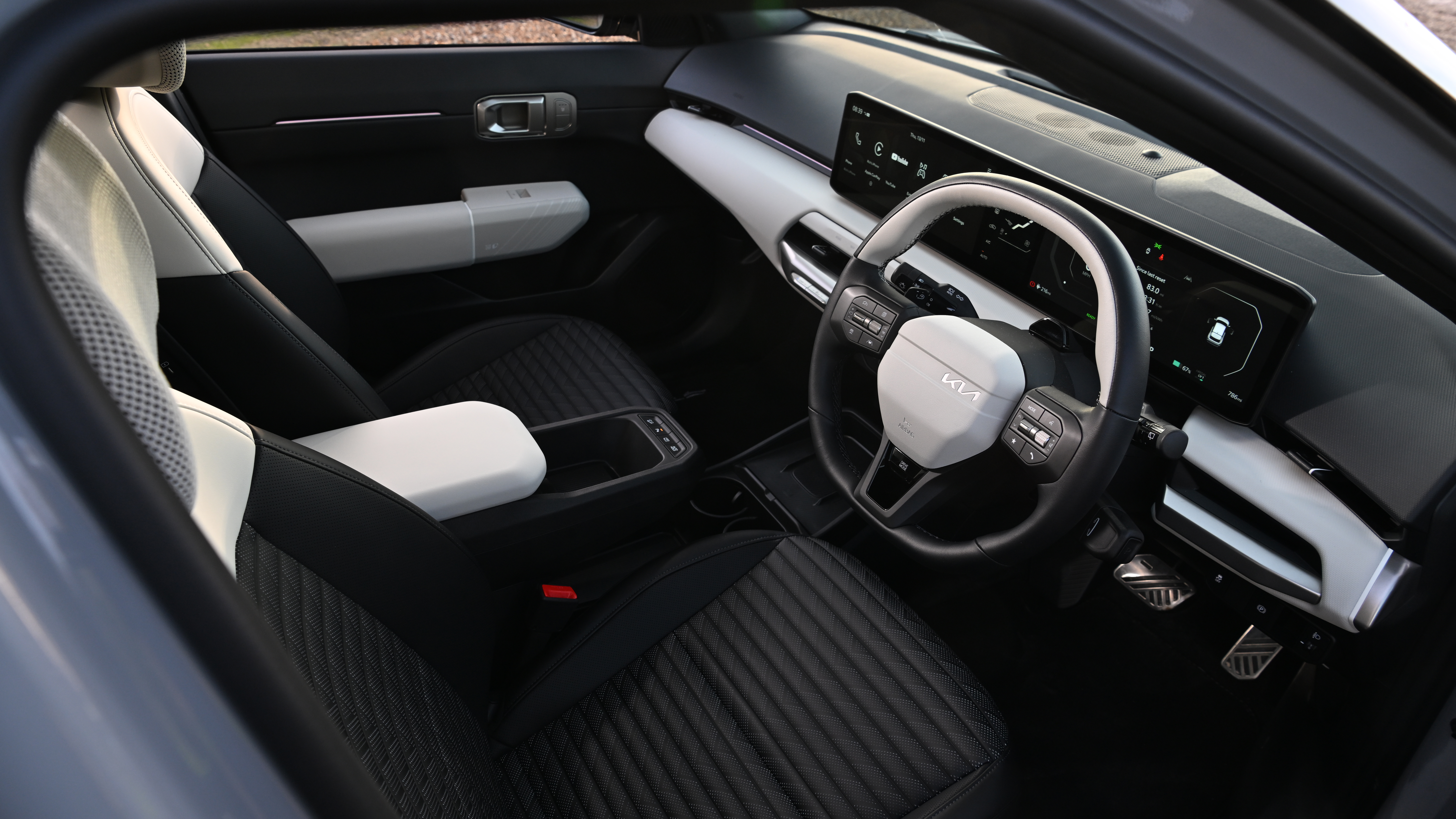 Kia EV4 - interior, front 