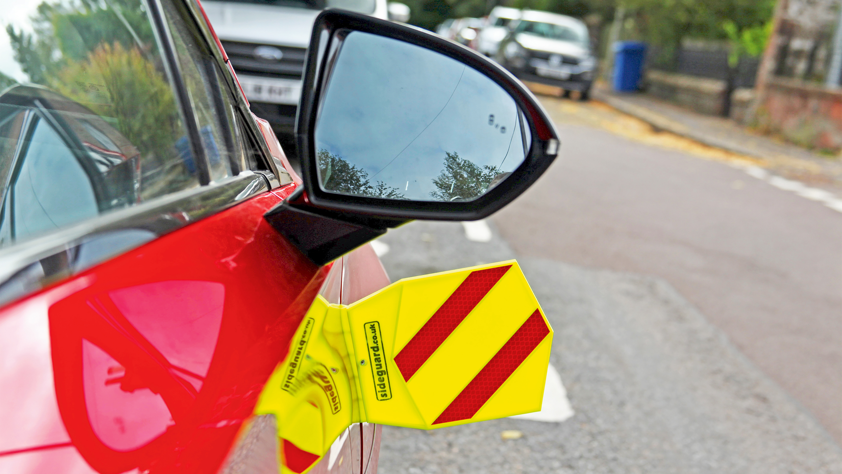 Sideguard on-street parking reflector