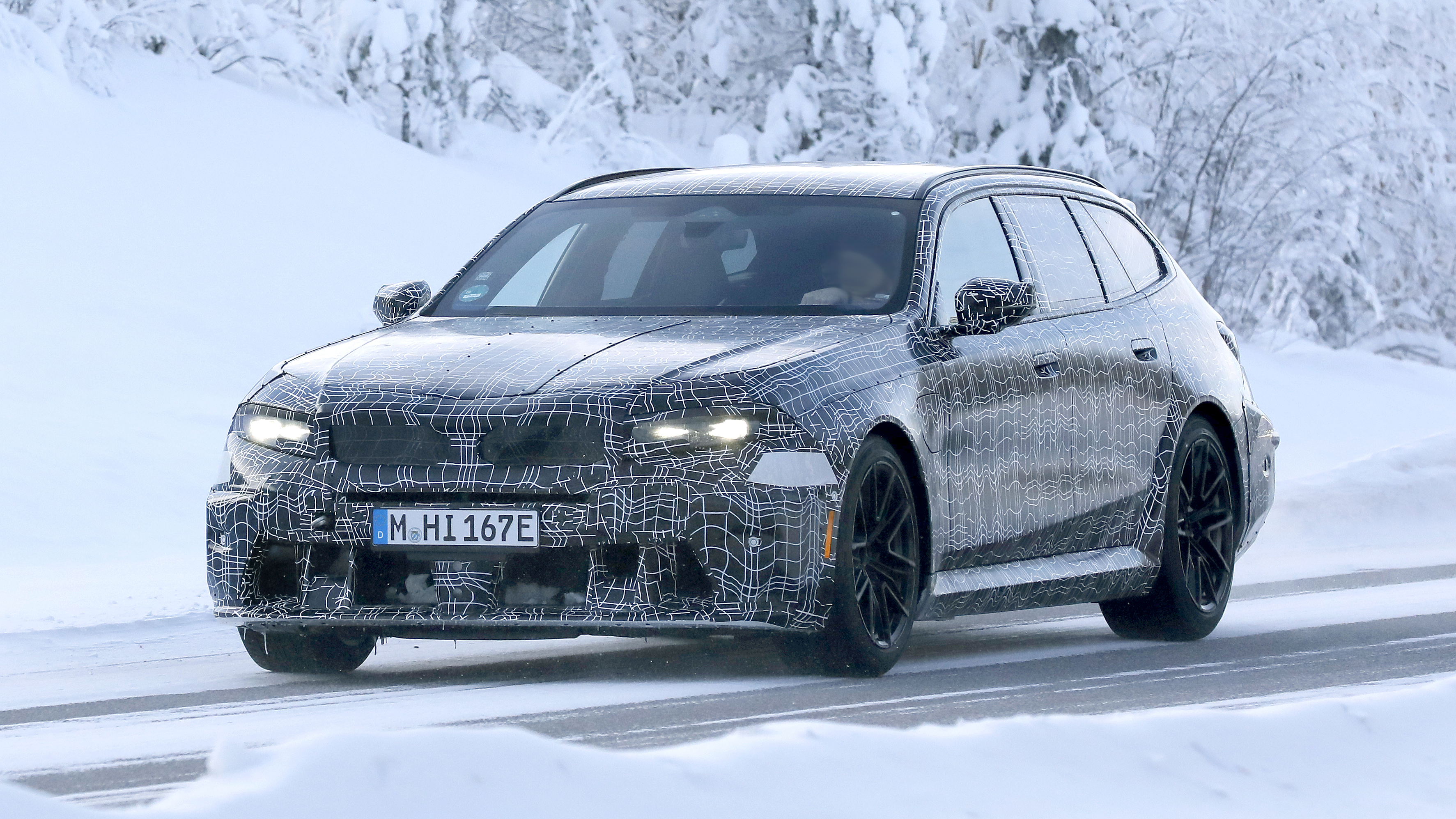 New BMW M5 Touring spy shot - front 