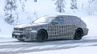 New BMW M5 Touring spy shot - front 3/4