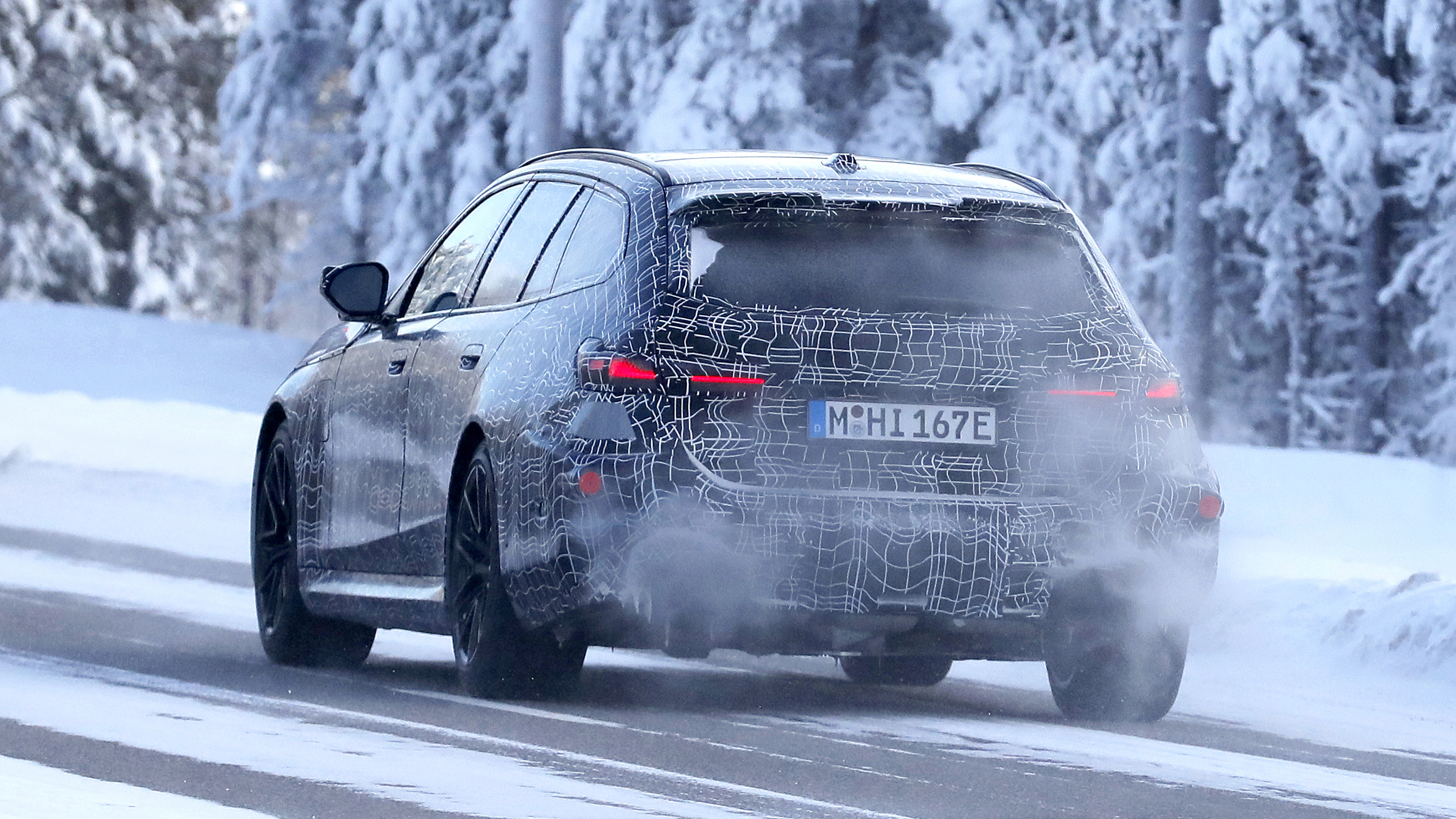 New BMW M5 Touring spy shot - rear tracking 