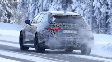 New BMW M5 Touring spy shot - rear tracking