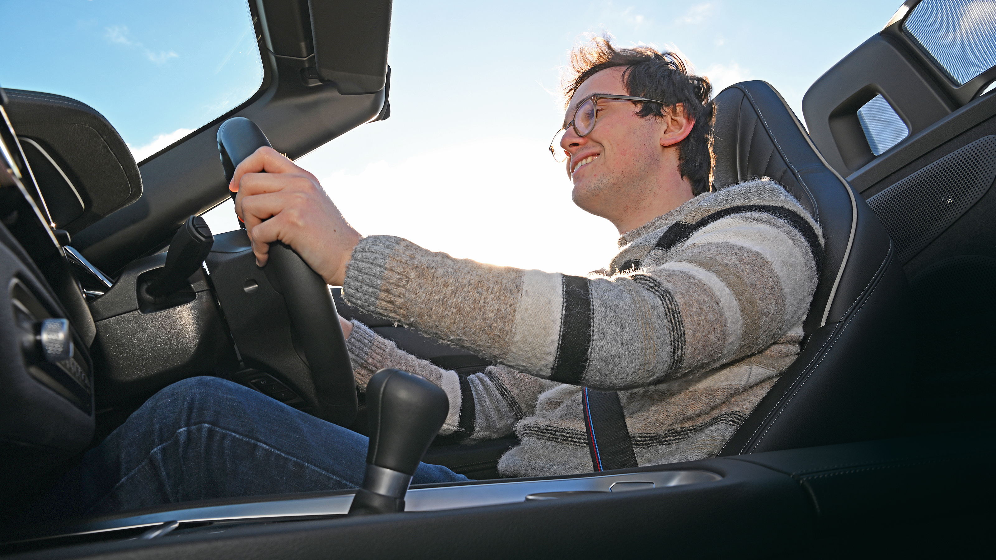 Auto Express consumer reporter Tom Jervis driving a BMW Z4