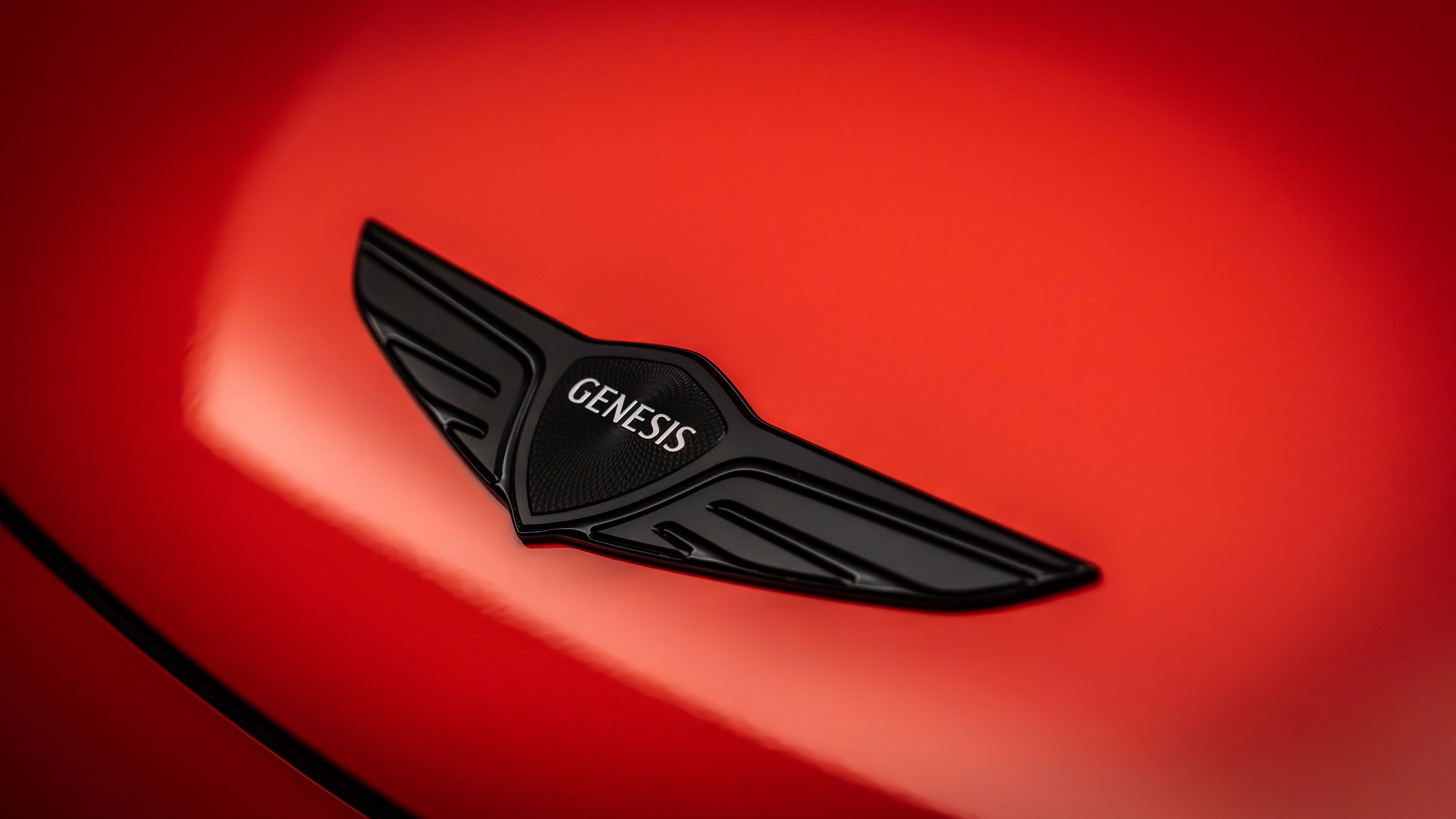 Genesis GV60 Magma - Genesis badge