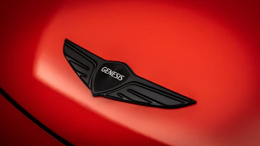Genesis GV60 Magma - Genesis badge