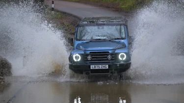 Ineos Grenadier - driving through water (front)