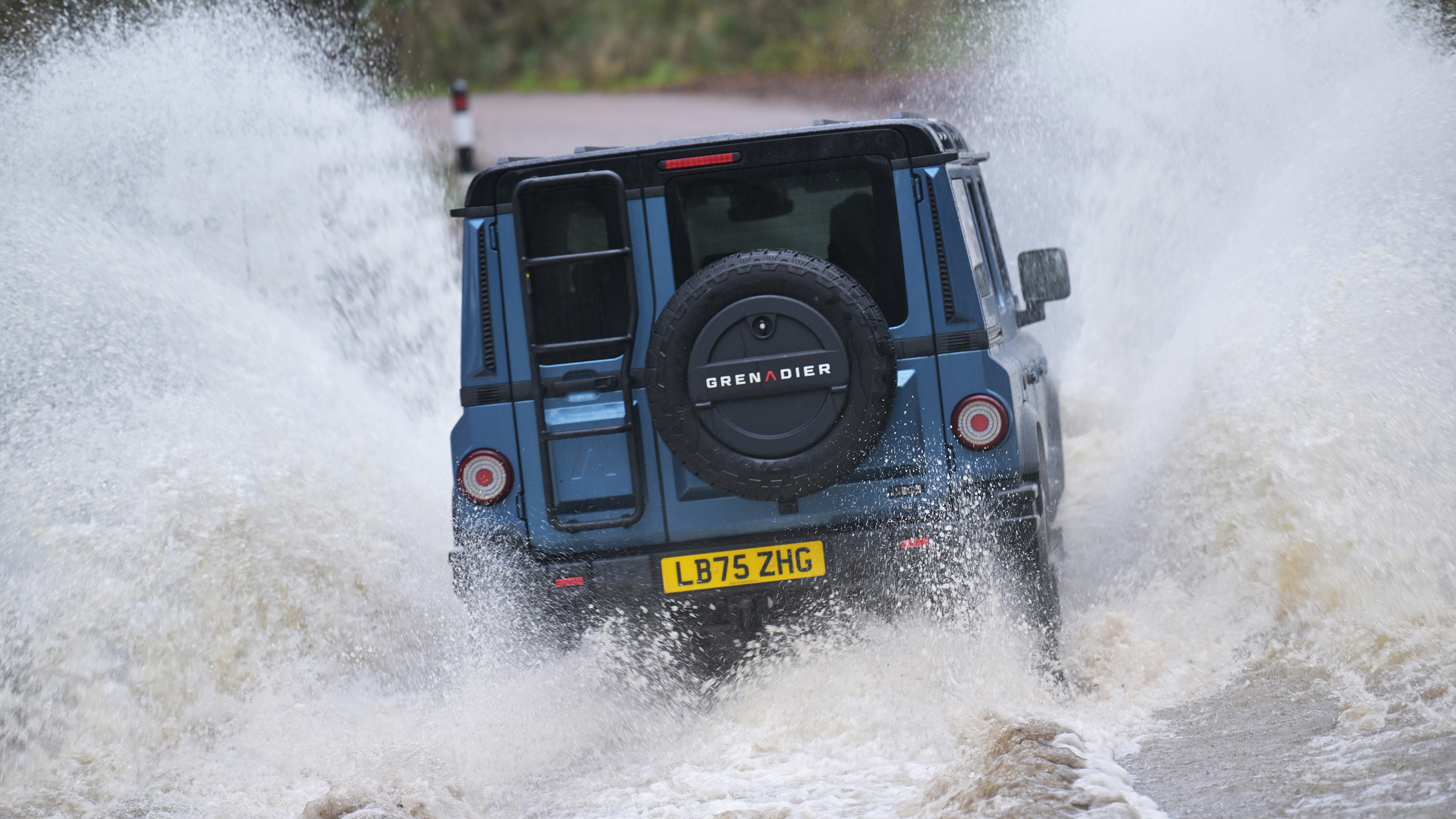 Ineos Grenadier - driving through water (rear) 