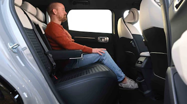 Kia EV4 - rear seats with former chief reviewer, Alex Ingram