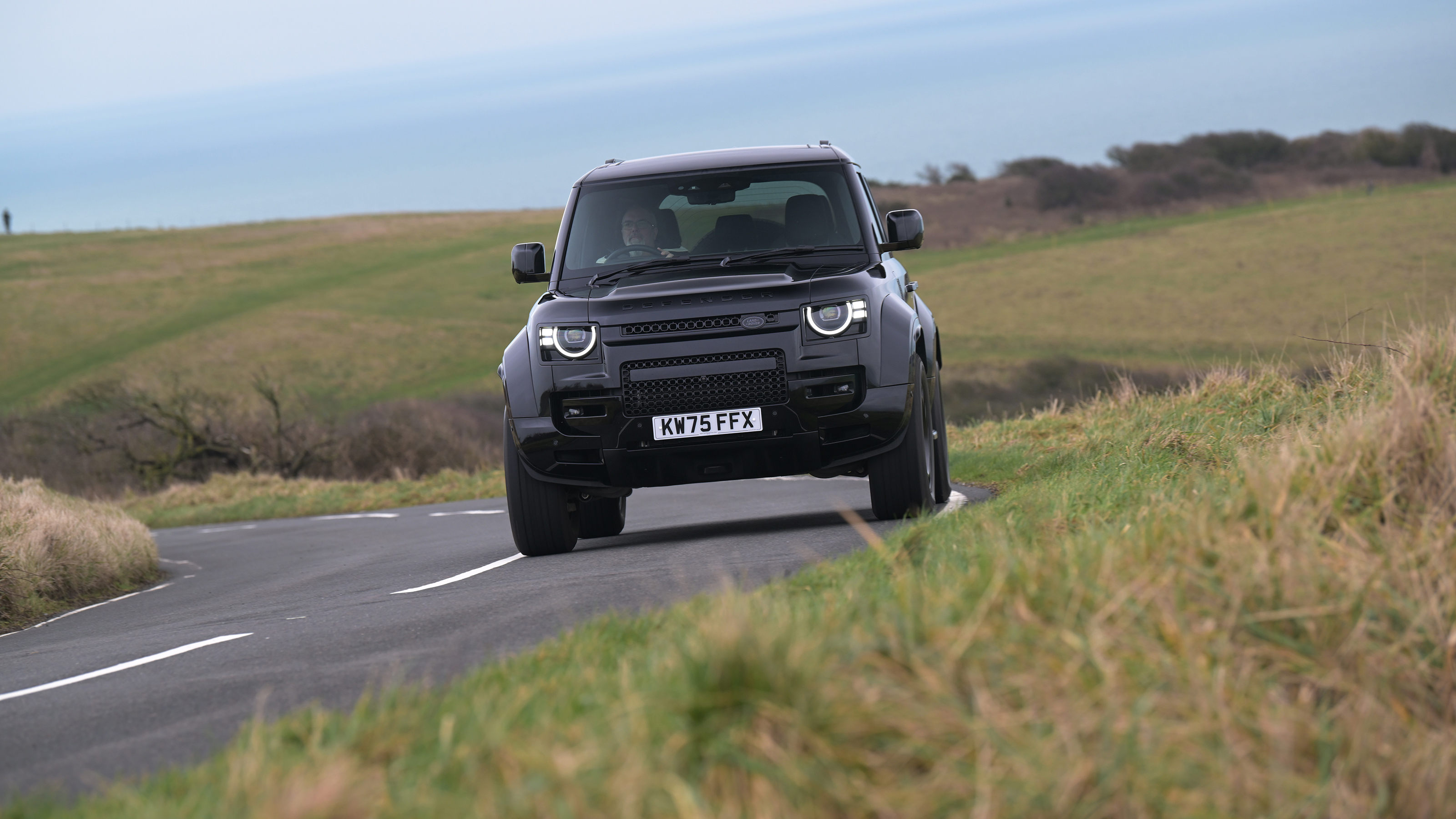Land Rover Defender OCTA Black - front cornering (dry)